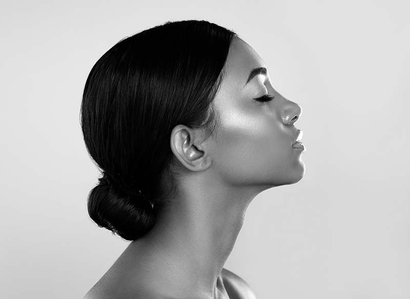 Dr. Alan Burke beautiful young woman posing side profile