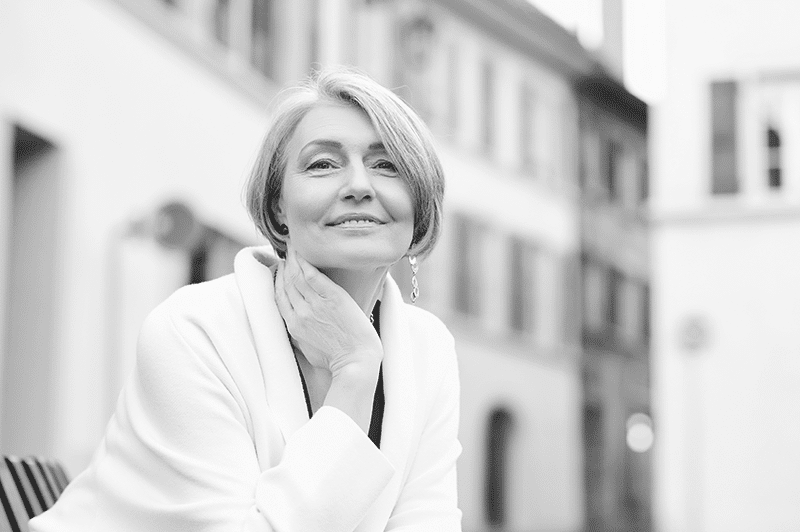 Stunning older woman outdoors gray hair