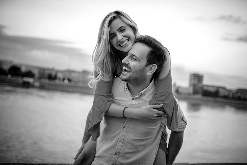 Loving couple by the river