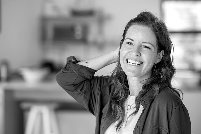 Happy mature woman laughing