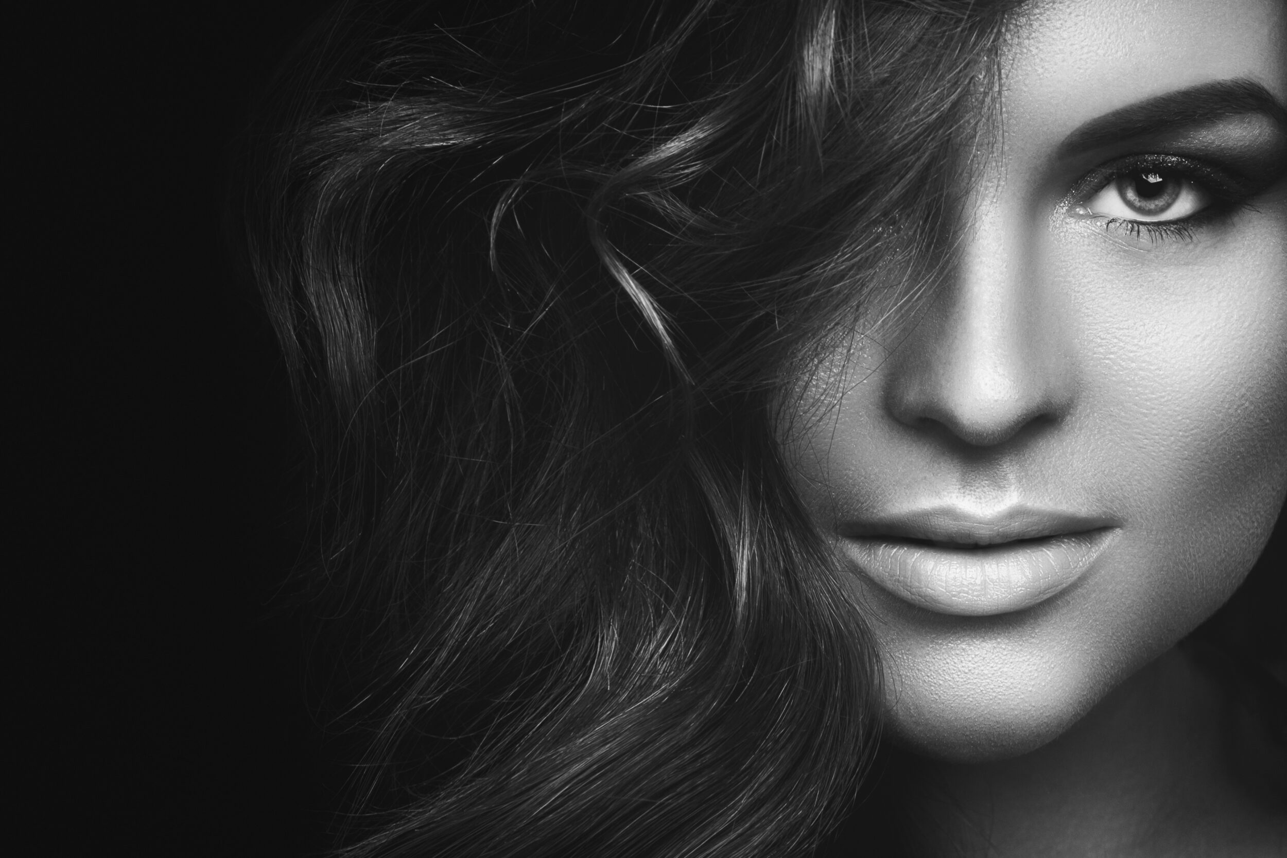 Woman with curly hair and beautiful make up